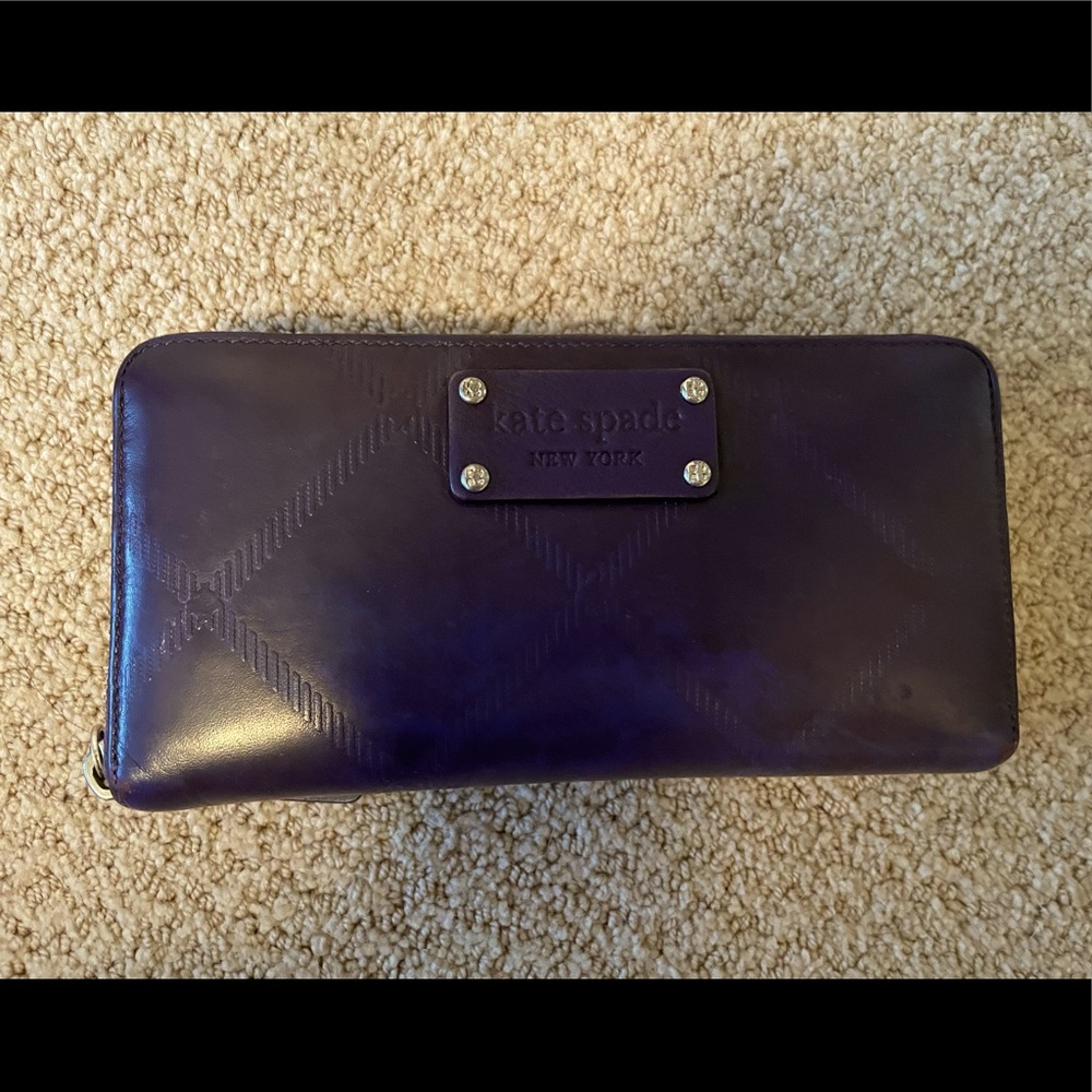 Kate Spade zip around wallet in purple